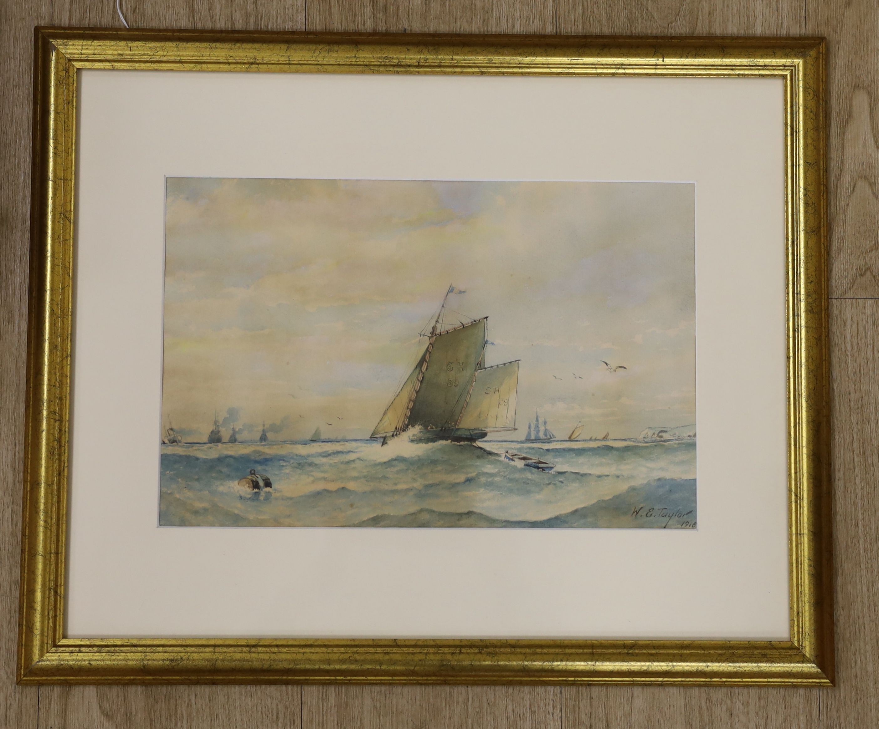 W. E. Taylor, watercolour, Shipping off the coast, signed and dated 1918, 24 x 37cm